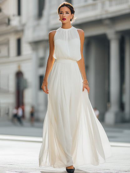 Pleated Halter Neck Maxi Dress with Flowing Skirt - Style View 2 | Clova