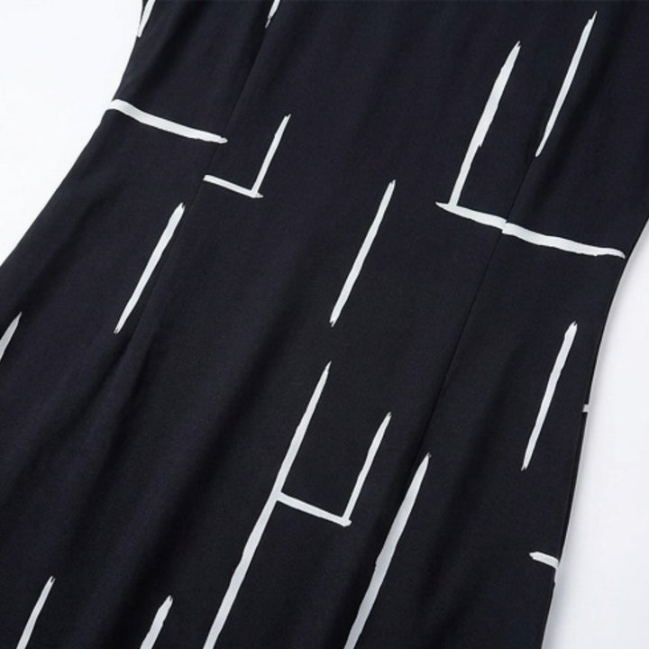Pocketed Dolman Dress with Abstract Print