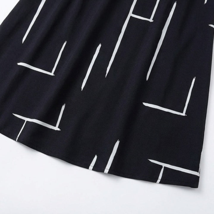 Pocketed Dolman Dress with Abstract Print