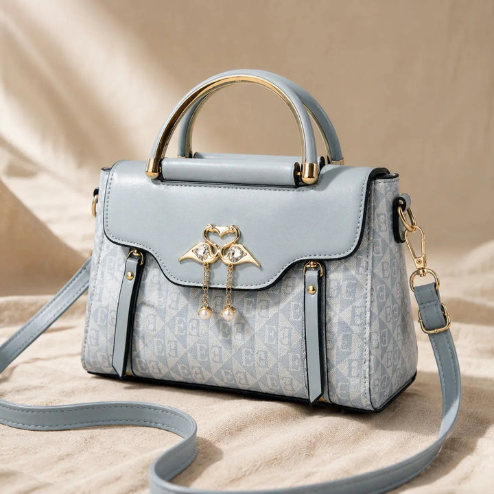 Swan-Clasp Structured Crossbody Bag with Gold Hardware