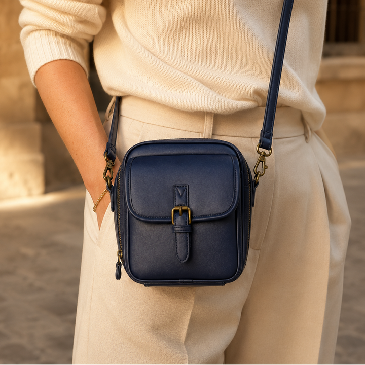 Structured PU crossbody bag with built-in wallet and glasses compartment