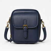 Structured PU crossbody bag with built-in wallet and glasses compartment